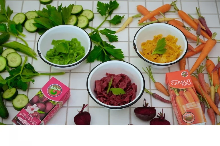 3 bolws with green orang and beetroot pulled noodles